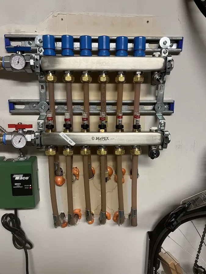 Plumber performing Leak Detection at a residential property in Sullivan